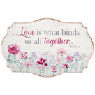 Metalen-Wandschild-love-is-what-binds-us